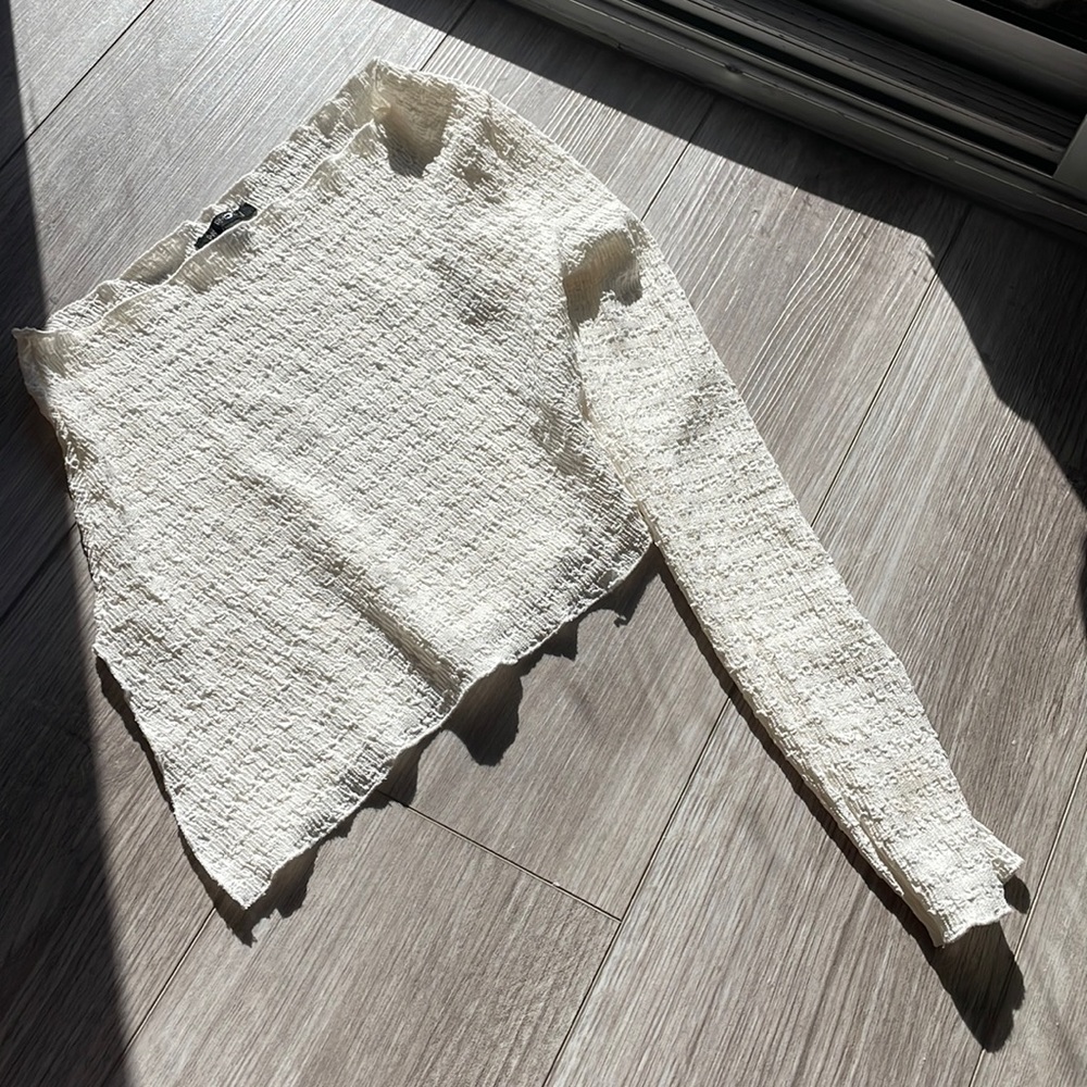 Asymmetrical size small shirt